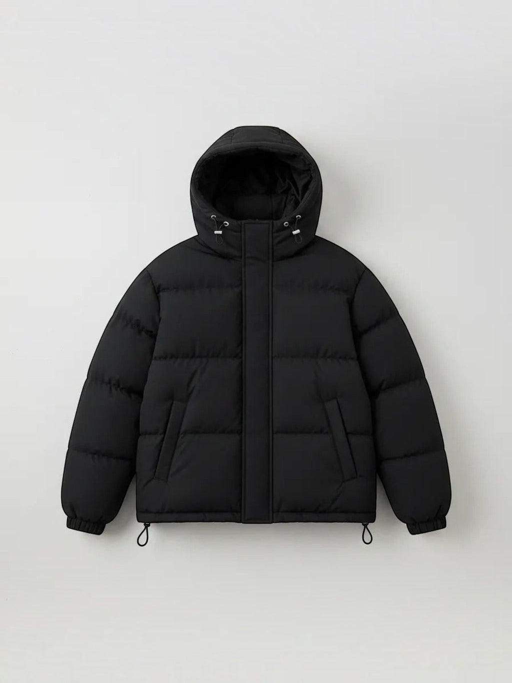 Chaqueta puffer negra unisex cozyvibe con capucha, diseño acolchado oversize y cierre frontal para invierno