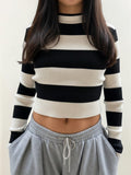 Sweater canalé a rayas negro y crema, detalle tejido - Cozy Vibes